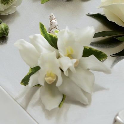 White Mini Cymbidium Boutonniere –  Oceanside Florist, Oceanside NY